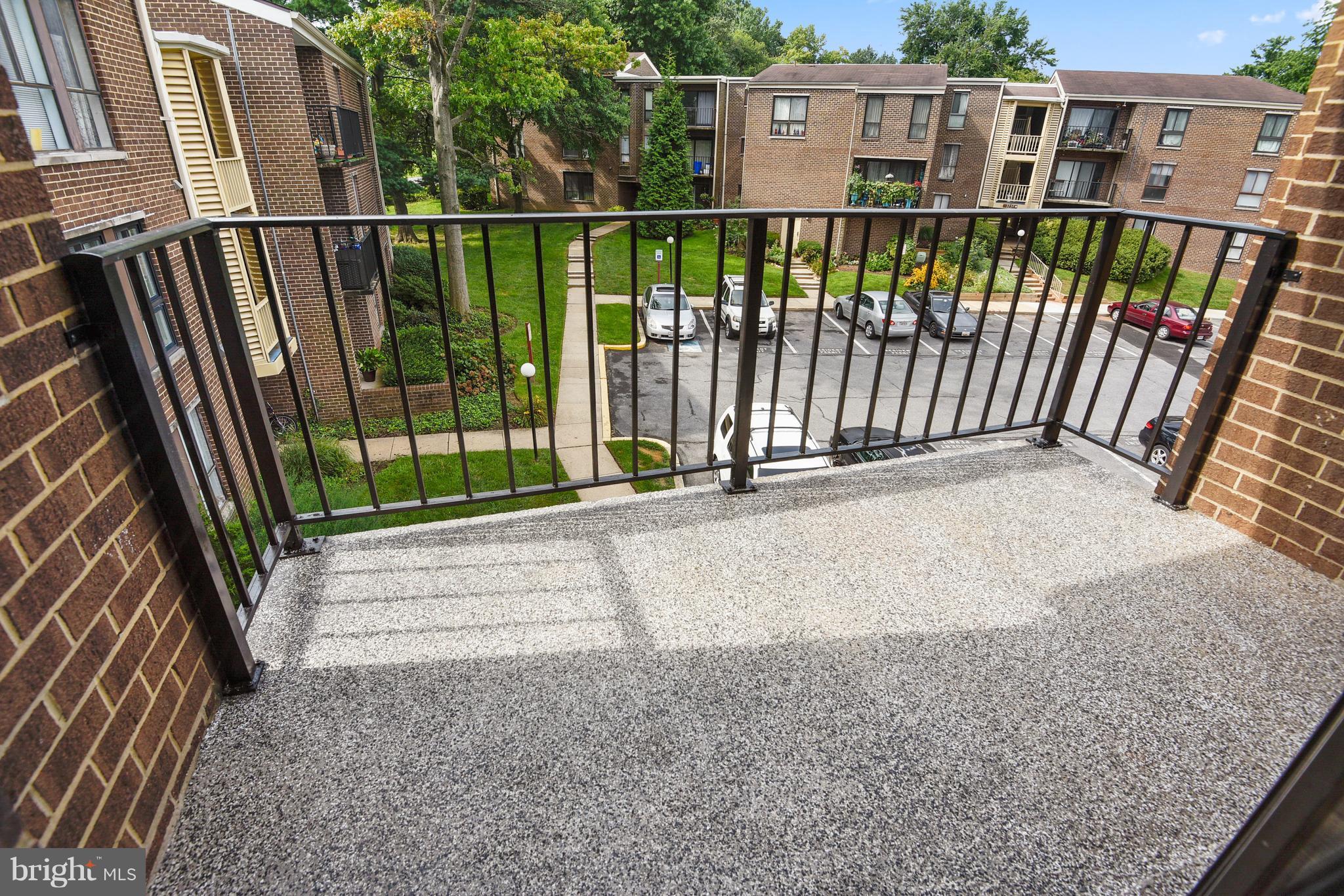 3224 Spartan Road, Unit 3E6 Olney, MD 20832 - Photo 2 of 27 a view of a street from a balcony