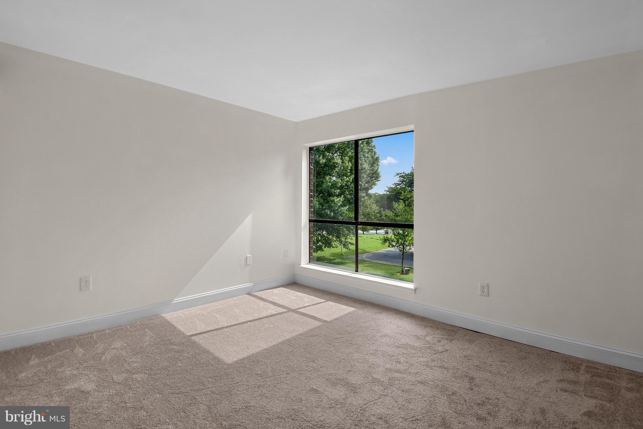 3224 Spartan Road, Unit 3E6 Olney, MD 20832 - Photo 14 of 27 a view of an empty room with a window
