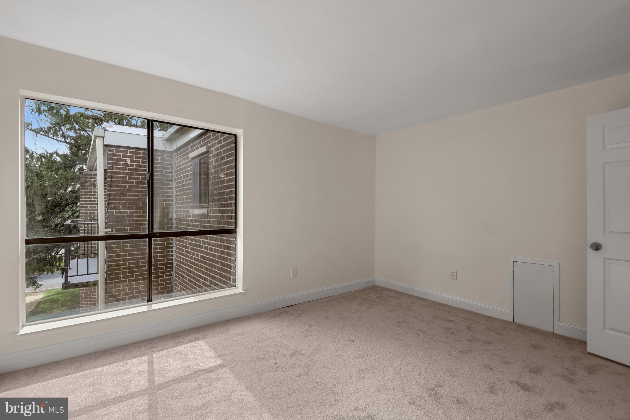 3224 Spartan Road, Unit 3E6 Olney, MD 20832 - Photo 16 of 27 a view of an empty room with a window