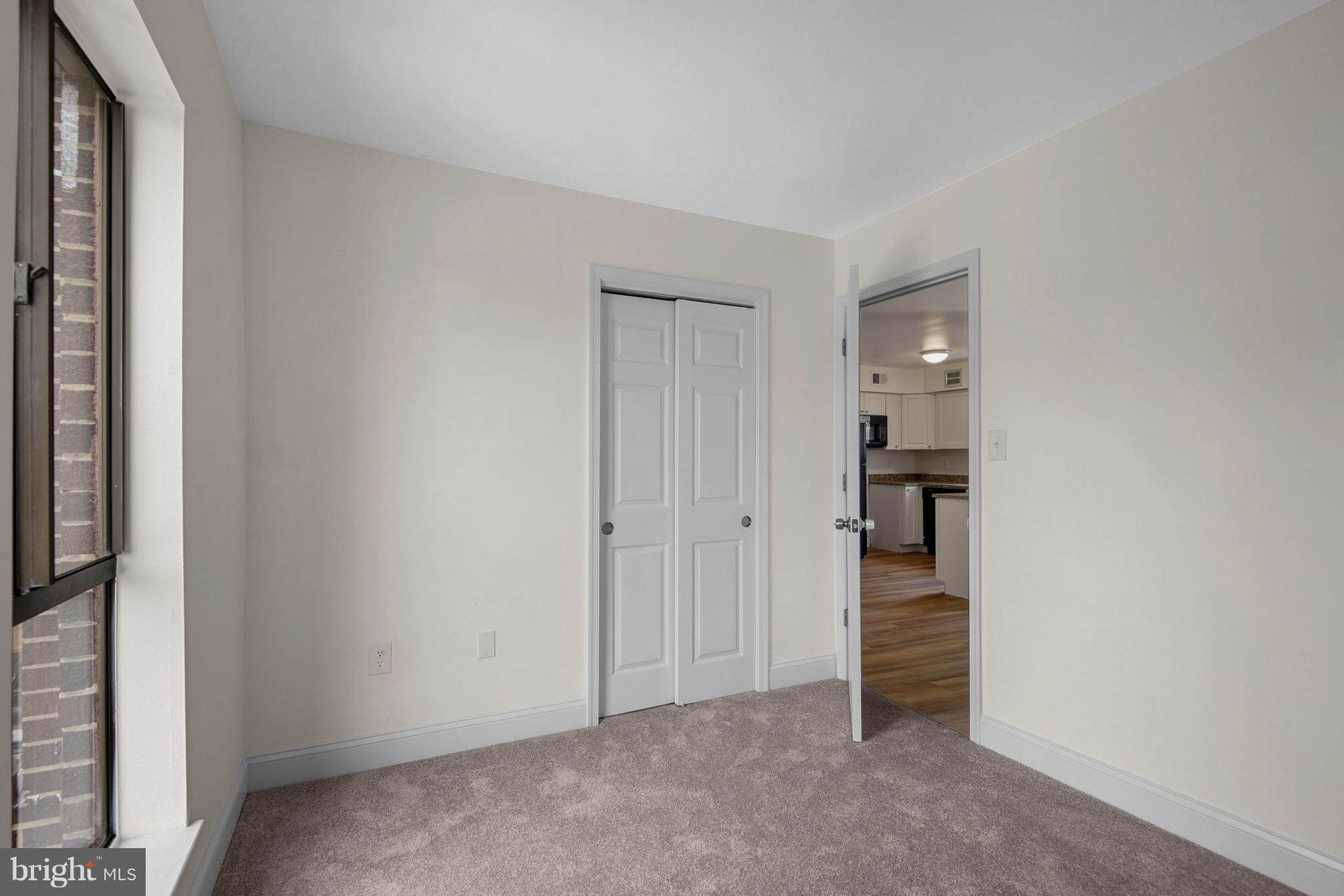 3224 Spartan Road, Unit 3E6 Olney, MD 20832 - Photo 19 of 27 wooden floor and closet in a room