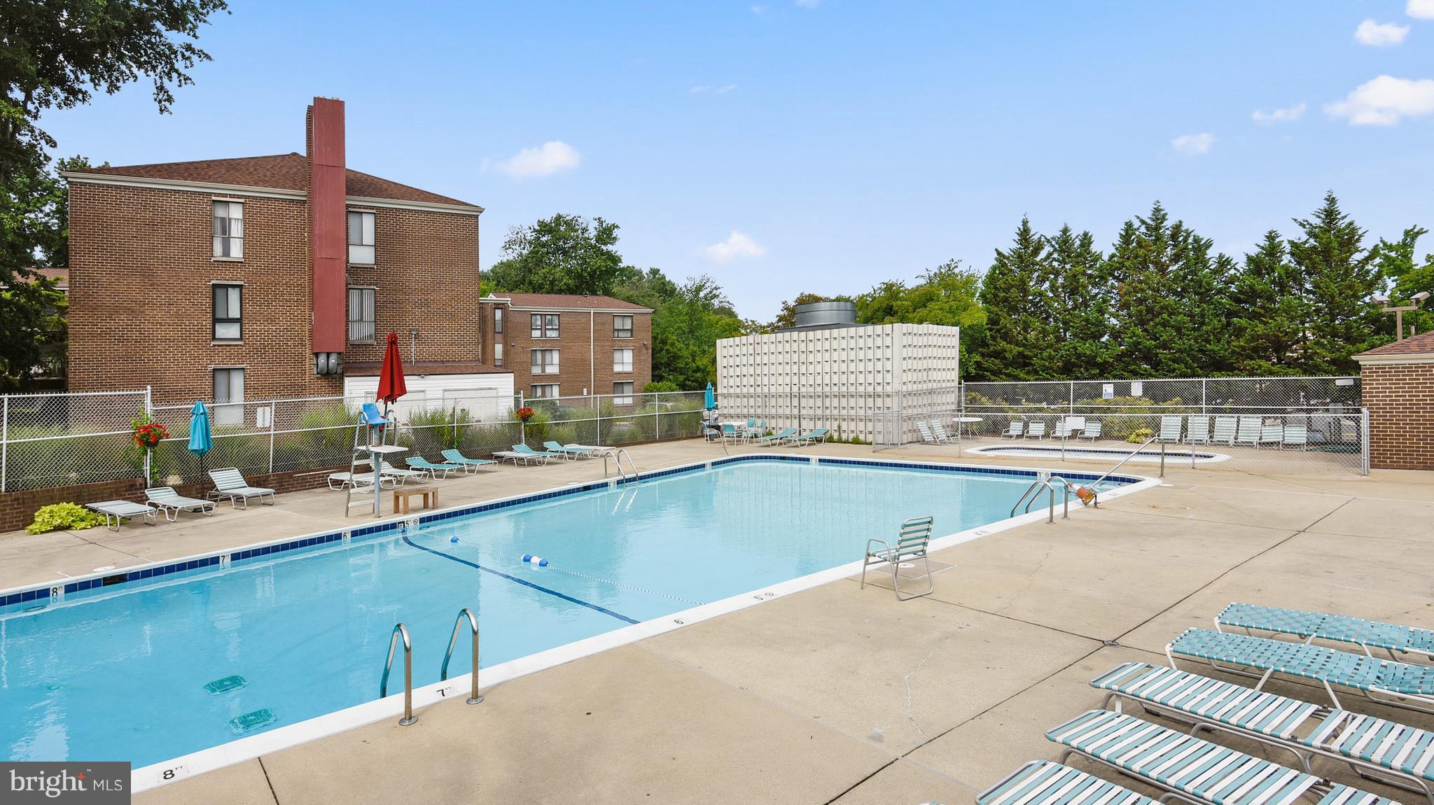 3224 Spartan Road, Unit 3E6 Olney, MD 20832 - Photo 27 of 27 a view of a kitchen with a sink and dishwasher with wooden floor
