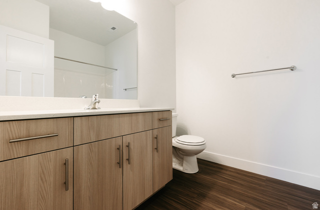 4655 South 720 West, Unit I304 Mapleton, UT 84664 - Photo 8 of 16 Full bathroom with vanity and dark wood-style flooring