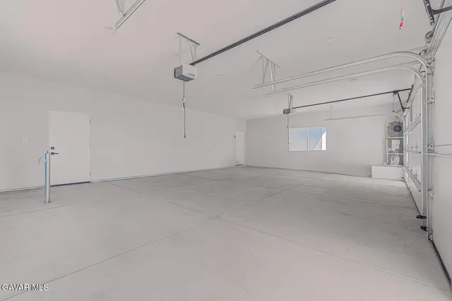 a view of a room with an empty space