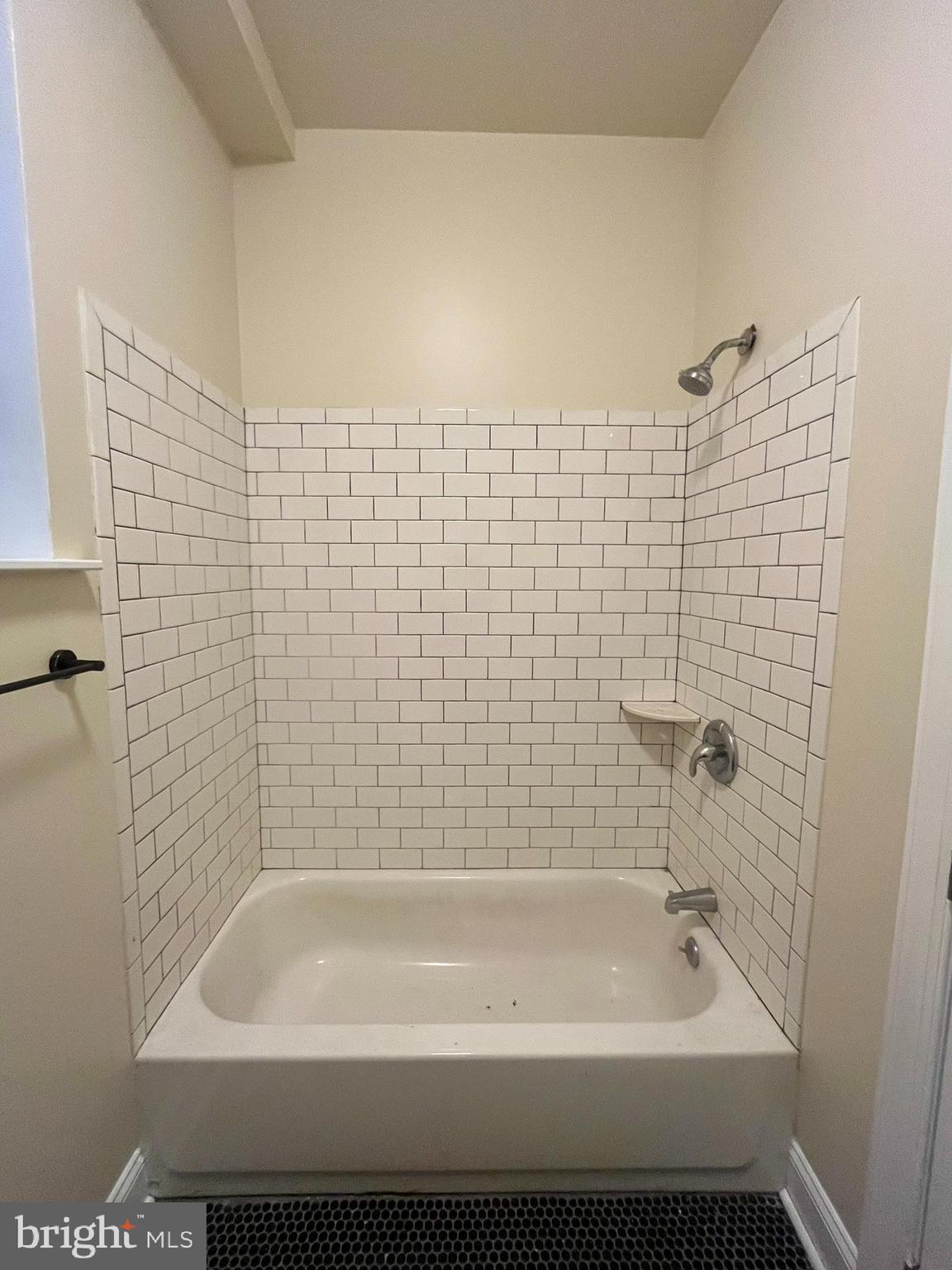 4946 Walnut Street, Unit 2F Philadelphia, PA 19139 - Photo 7 of 20 a bathroom with a bathtub