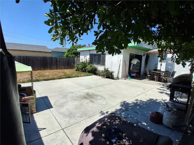 a view of a backyard of the house