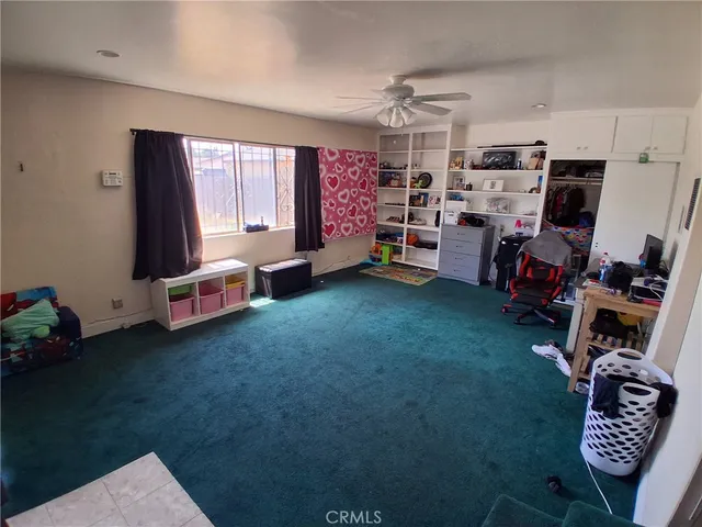 a room with furniture and a flat screen tv