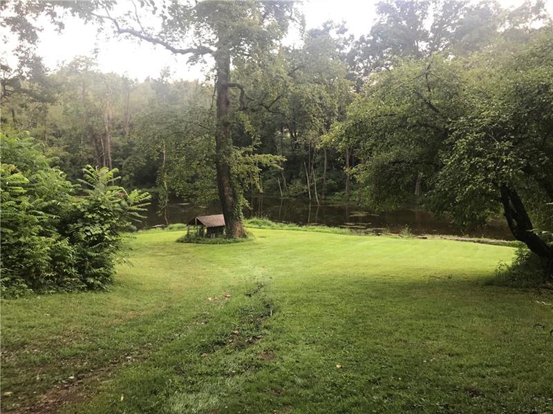 4020 Ewalt Road Gibsonia, PA 15044 - Photo 22 of 25 Another perspective - you can walk around the pond, fish, watch the turtles, play badminton and so much more.