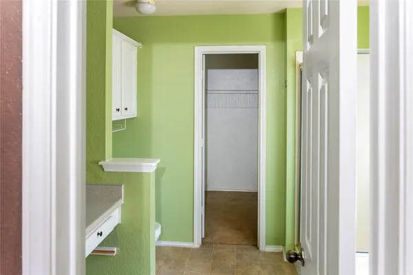 a white bath tub sitting in a bathroom
