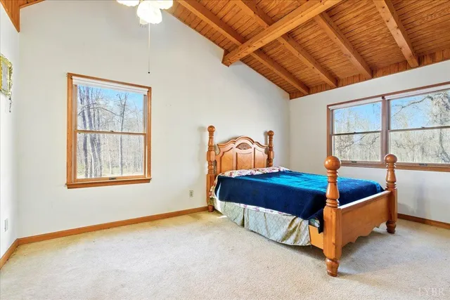 a bedroom with furniture and window
