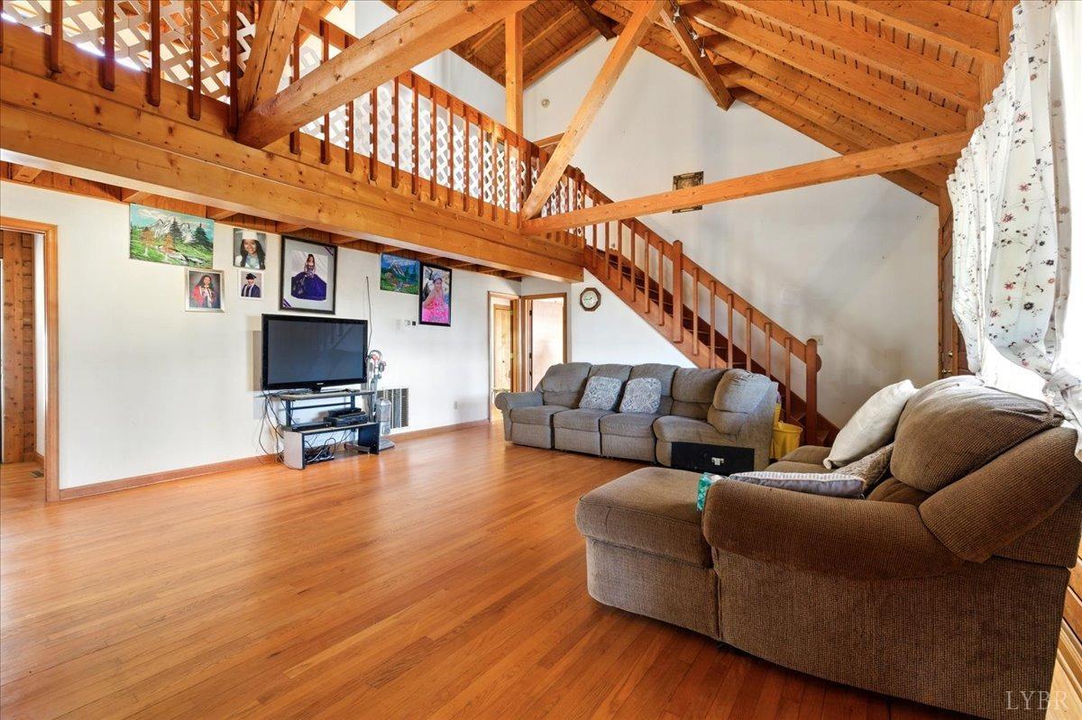 2192 Hixburg Road Pamplin, VA 23958 - Photo 9 of 31 a living room with furniture and a flat screen tv