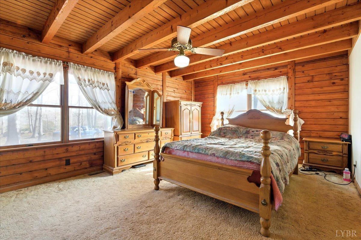 2192 Hixburg Road Pamplin, VA 23958 - Photo 10 of 31 a bedroom with a bed and a large window with the outer view