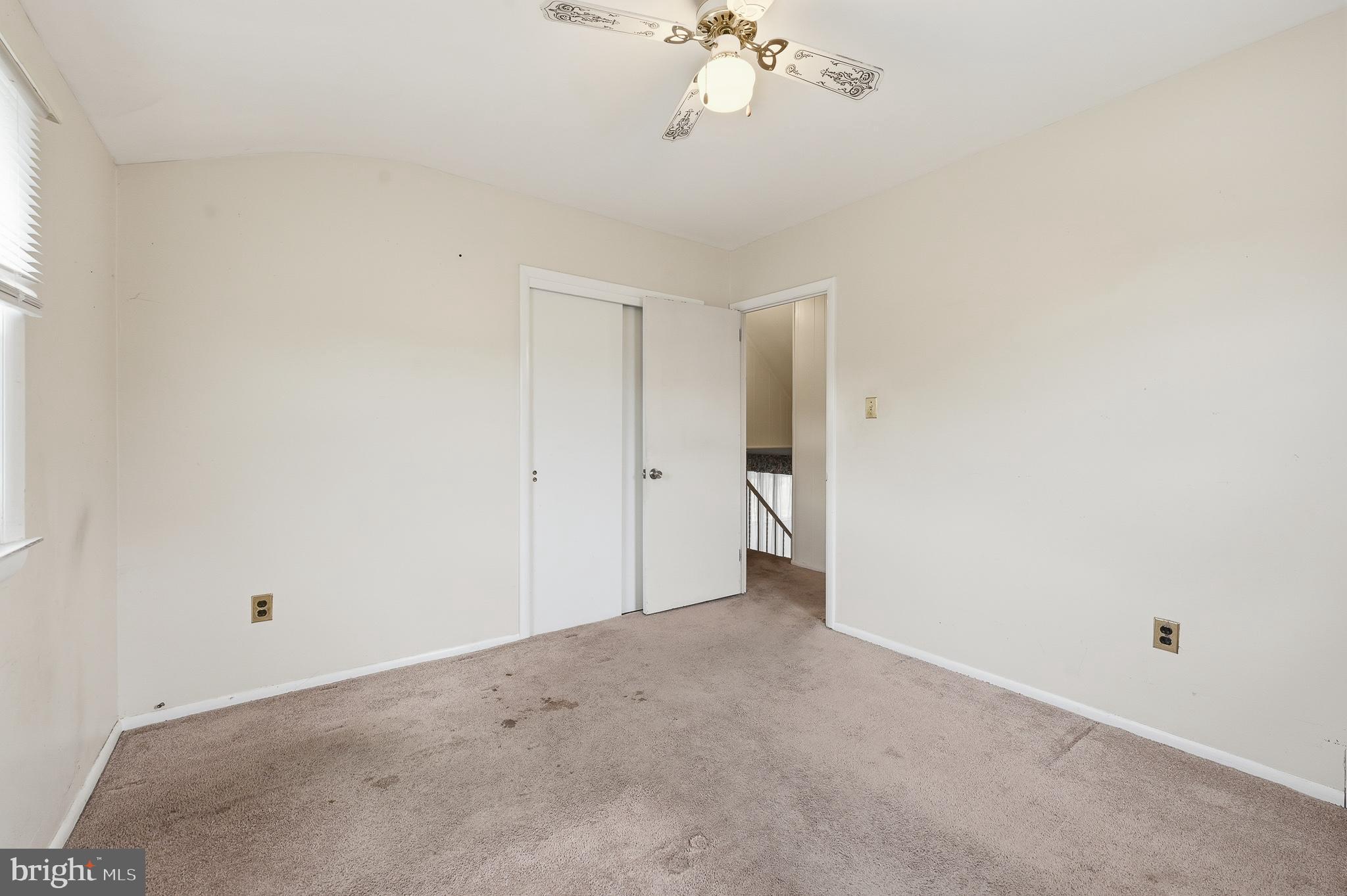 406 Blackstone Road Newark, DE 19713 - Photo 27 of 27 a view of a chandelier fan and hardwood floor