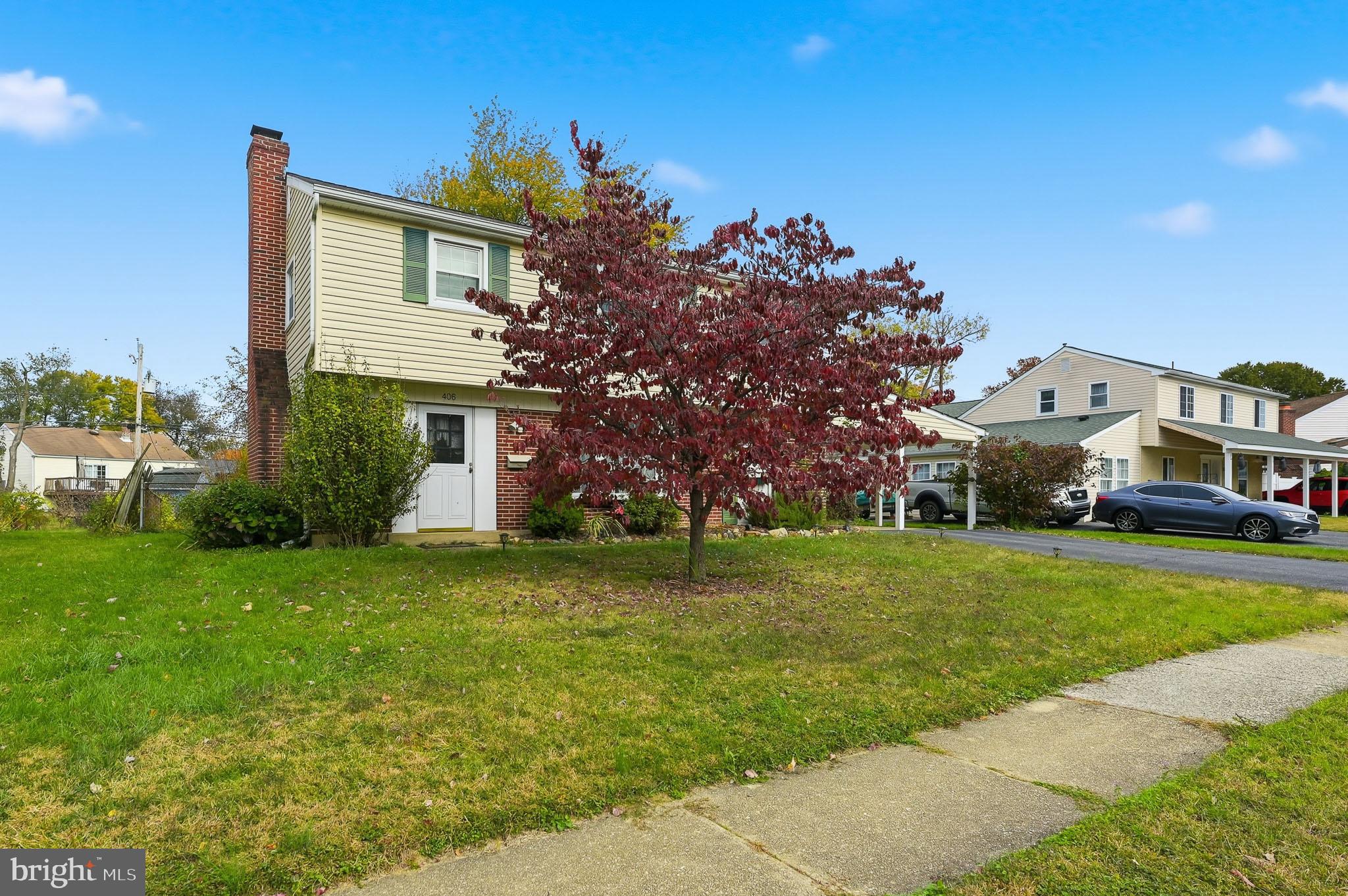 406 Blackstone Road Newark, DE 19713 - Photo 3 of 27 a front view of a house with a yard