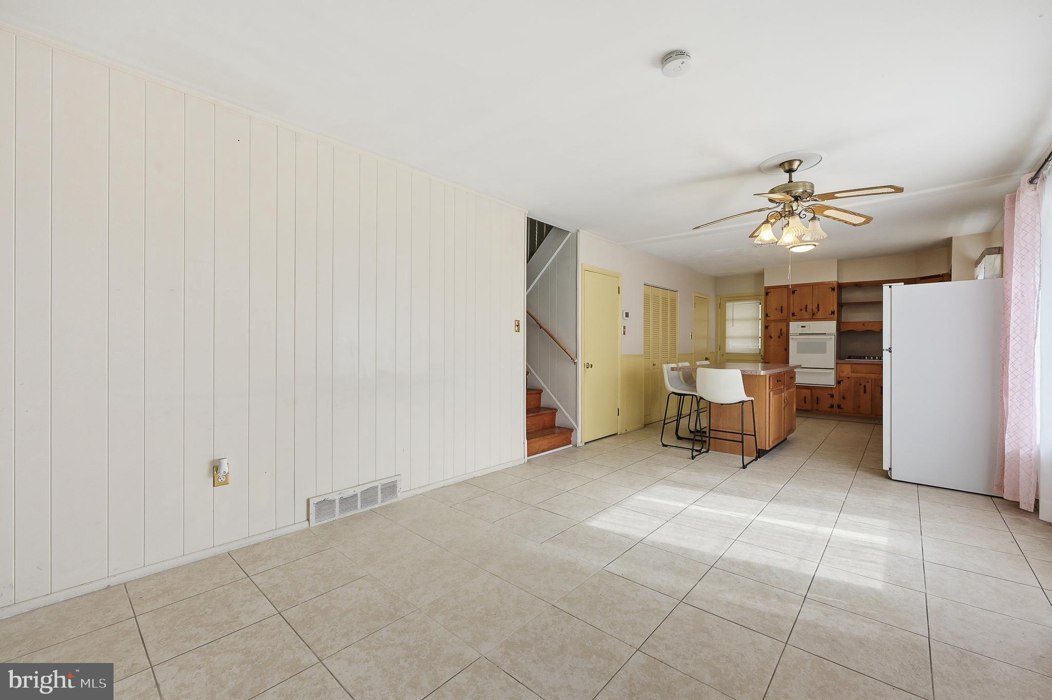406 Blackstone Road Newark, DE 19713 - Photo 7 of 27 a view of a livingroom with furniture and chandelier fan