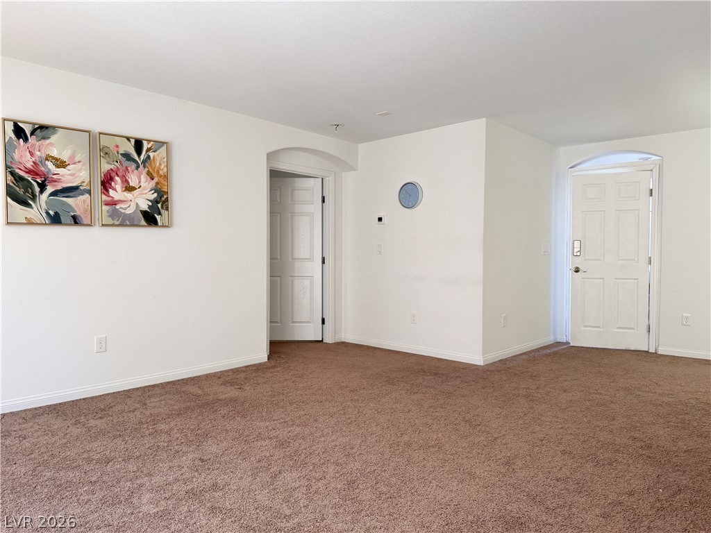7777 South Westwind Road Las Vegas, NV 89139 - Photo 3 of 46 A spacious, neutral-toned interior ready for your personal touch.