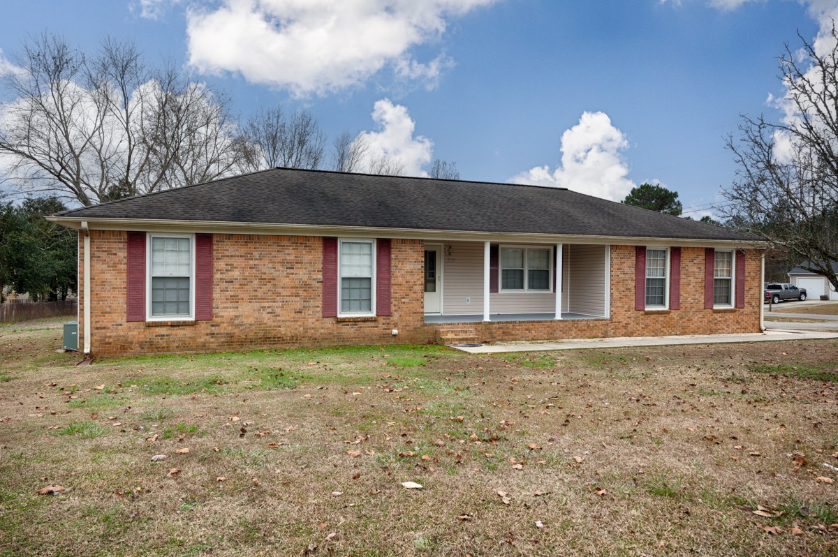 2134 Ready Section Road Toney, AL 35773 - Photo 2 of 35 a front view of a house with garden