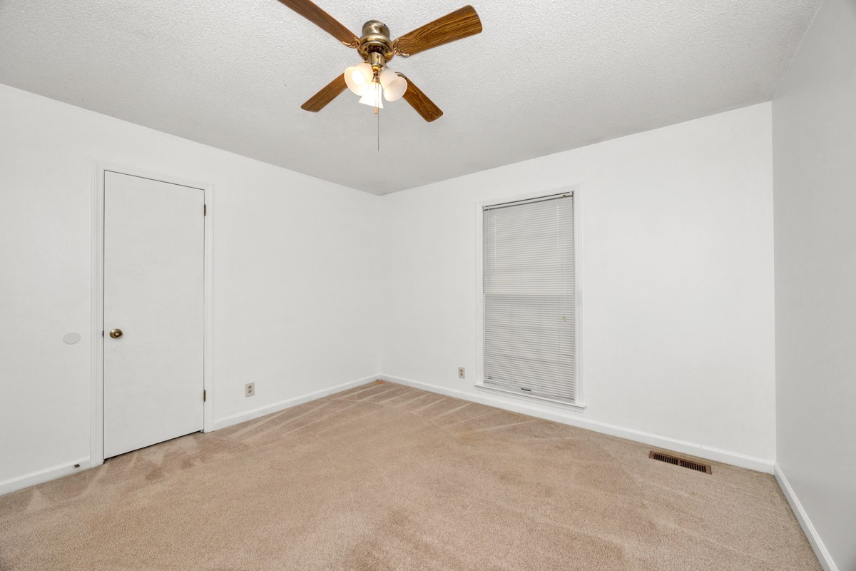 2134 Ready Section Road Toney, AL 35773 - Photo 26 of 35 wooden floor in an empty room