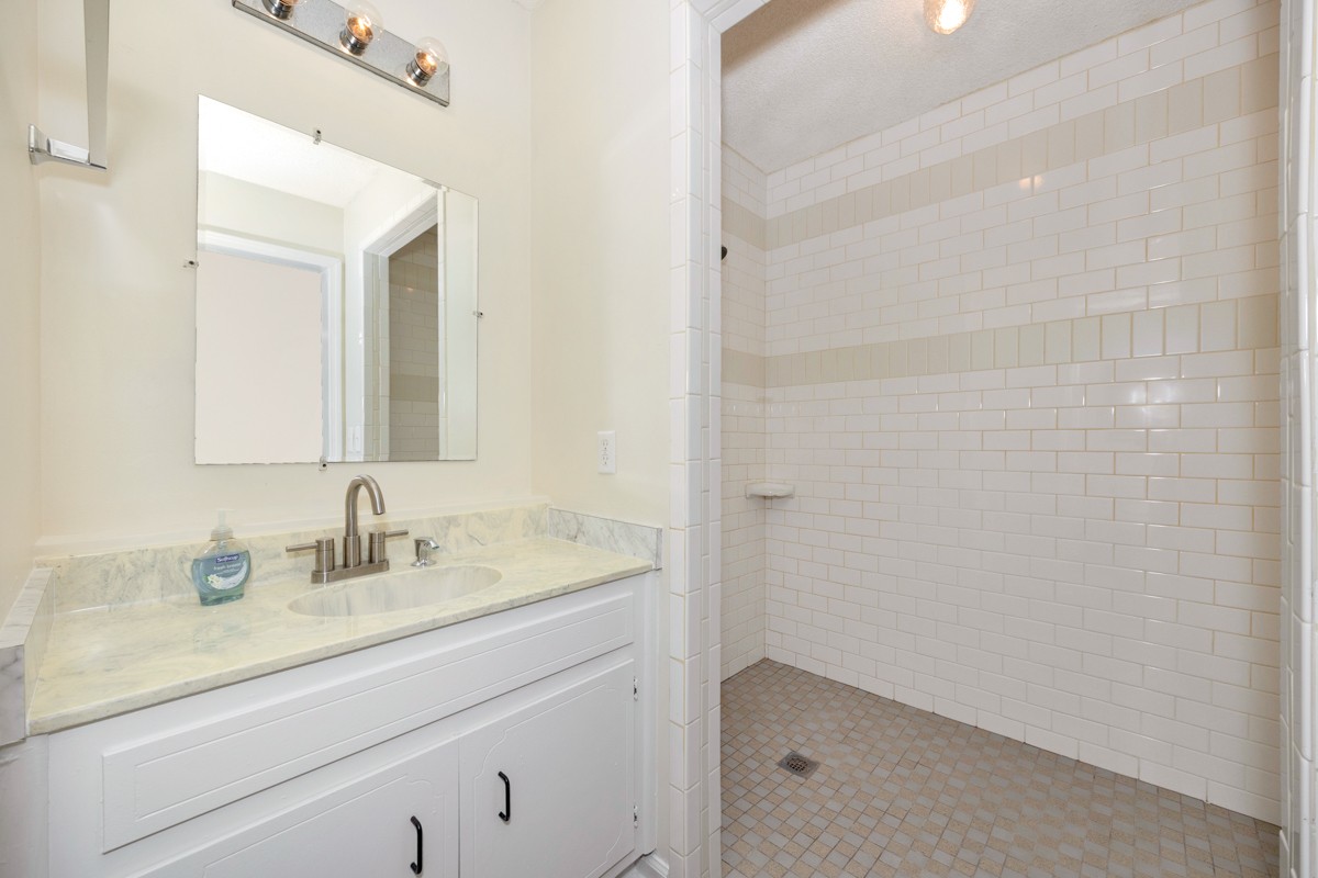 2134 Ready Section Road Toney, AL 35773 - Photo 31 of 35 a bathroom with a sink and a mirror