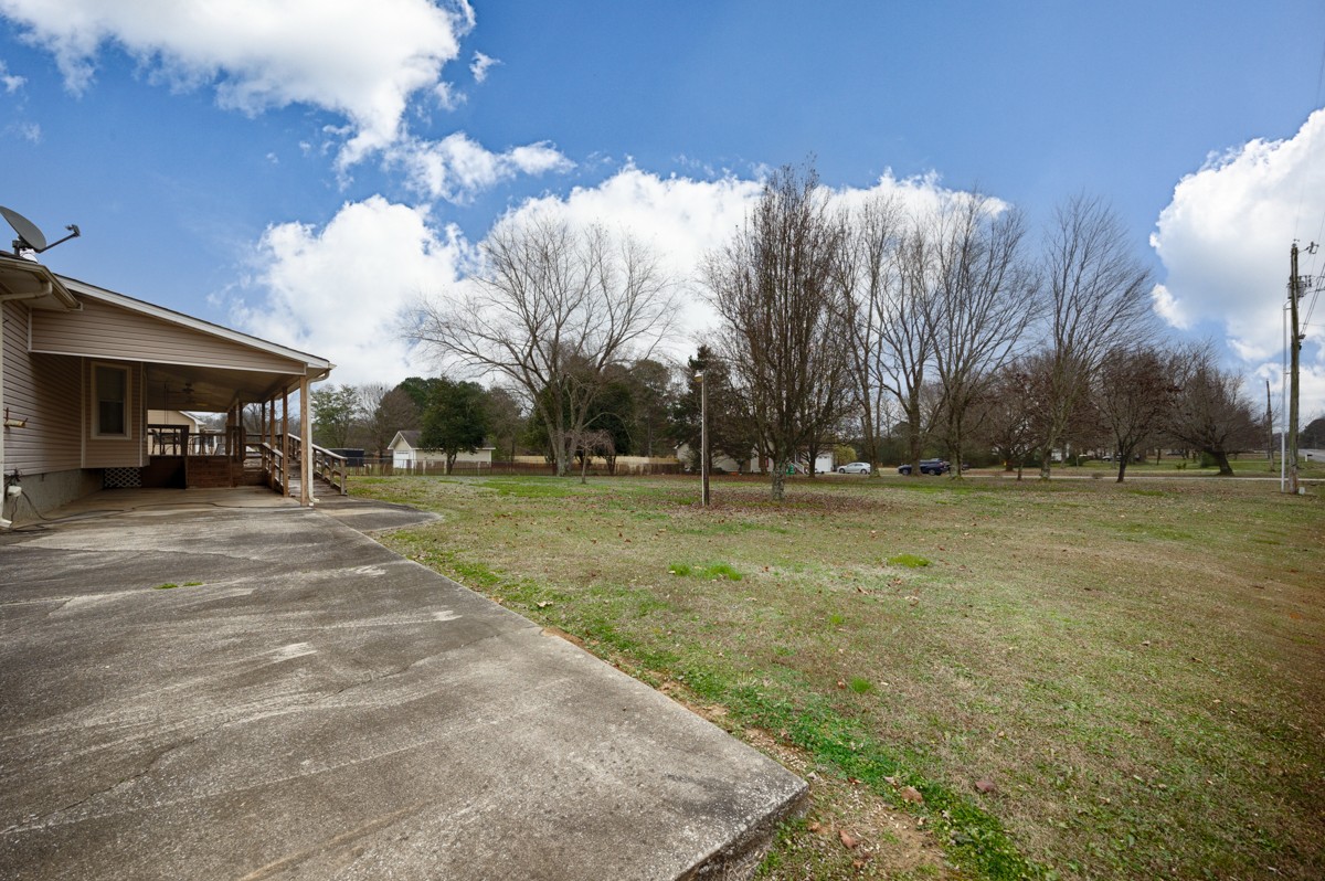 2134 Ready Section Road Toney, AL 35773 - Photo 35 of 35 a view of outdoor space with deck and tree