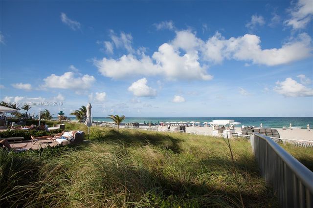 a street sign that is on a pole