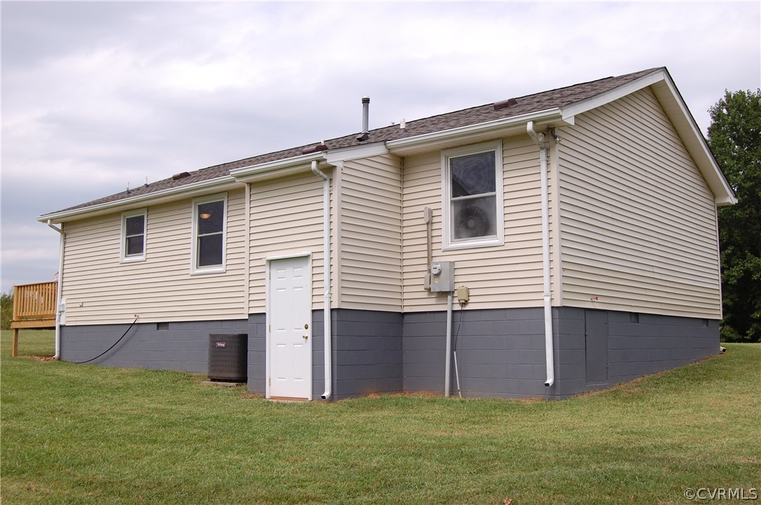 1509 Mc Cune Road Crewe, VA 23930 - Photo 3 of 18 a view of a house with a backyard