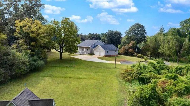 a view of a garden with pathway