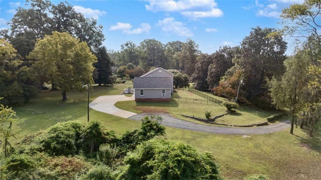 148 Simmons Street Trion, GA 30753 - Photo 14 of 73 a view of a water fountain in he middle of the green field