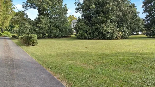 a dining room with furniture and chandelier
