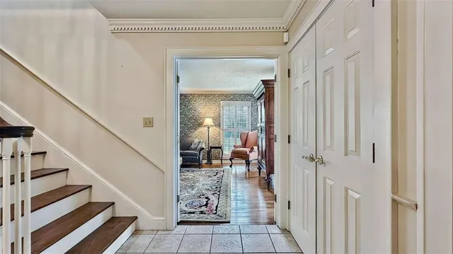 a large kitchen with stainless steel appliances granite countertop a stove and a sink