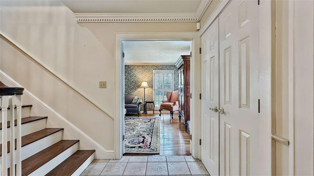 148 Simmons Street Trion, GA 30753 - Photo 19 of 73 a view of a hallway with wooden floor and staircase