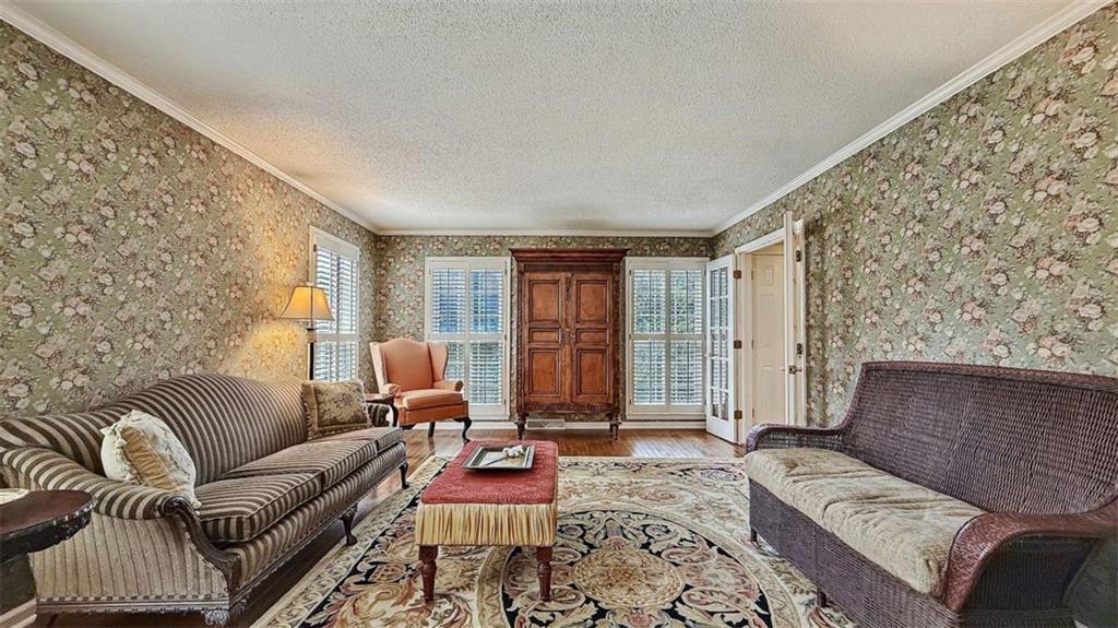 148 Simmons Street Trion, GA 30753 - Photo 20 of 73 a living room with furniture and wooden floor