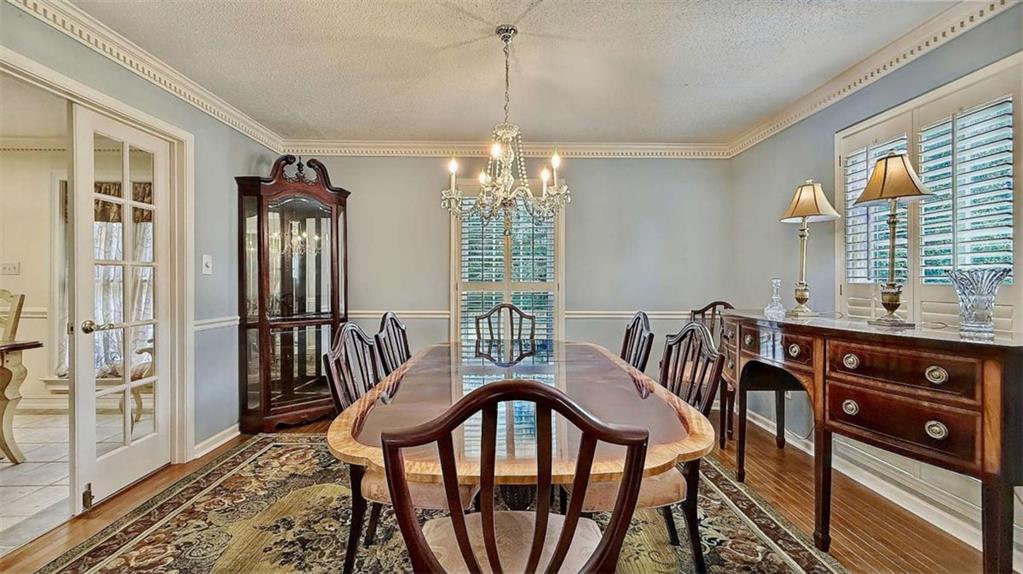 148 Simmons Street Trion, GA 30753 - Photo 21 of 73 a view of a dining room with furniture window and wooden floor