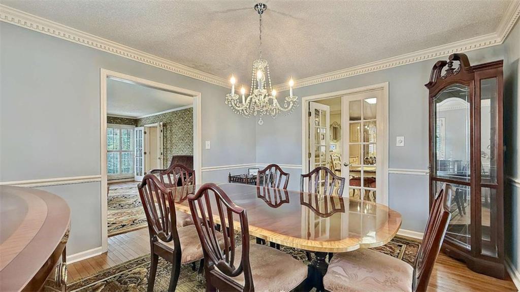 148 Simmons Street Trion, GA 30753 - Photo 22 of 73 a dining room with furniture and chandelier