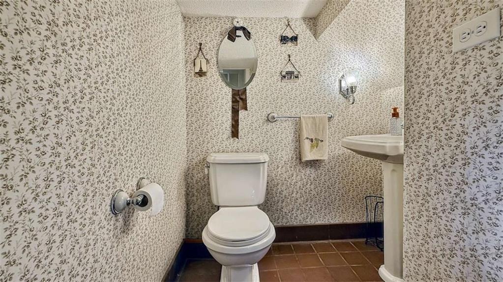 148 Simmons Street Trion, GA 30753 - Photo 28 of 73 a bathroom with a toilet and a shower