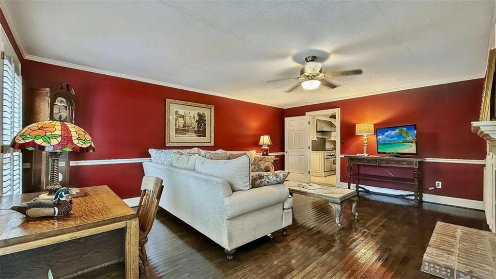 148 Simmons Street Trion, GA 30753 - Photo 29 of 73 a living room with furniture and flowers