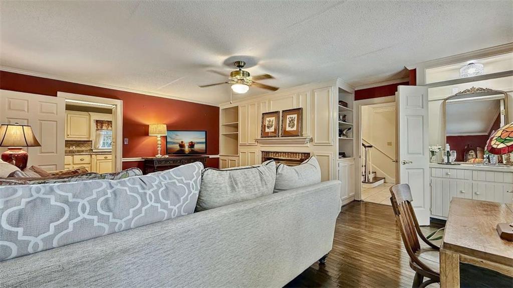 148 Simmons Street Trion, GA 30753 - Photo 30 of 73 a living room with furniture and a chandelier