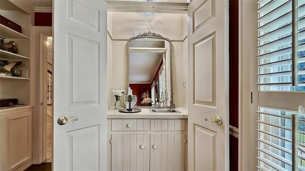 148 Simmons Street Trion, GA 30753 - Photo 31 of 73 a bathroom with a mirror and a sink