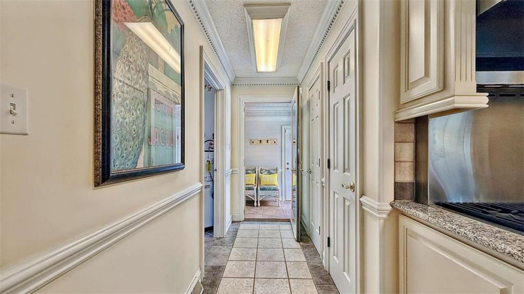 148 Simmons Street Trion, GA 30753 - Photo 32 of 73 a view of a hallway with wooden cabinets and staircase