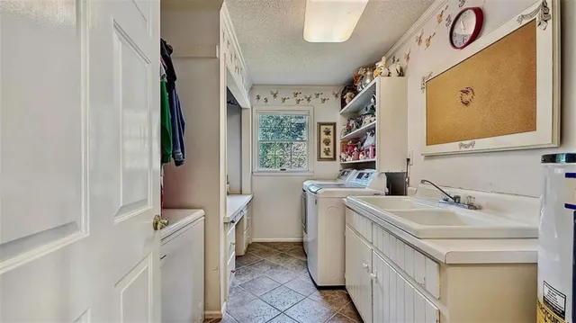 a bathroom with a bathtub and next to a window