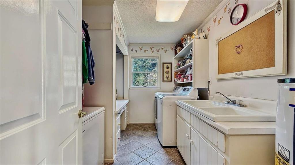 148 Simmons Street Trion, GA 30753 - Photo 33 of 73 a bathroom with a sink a toilet and a mirror