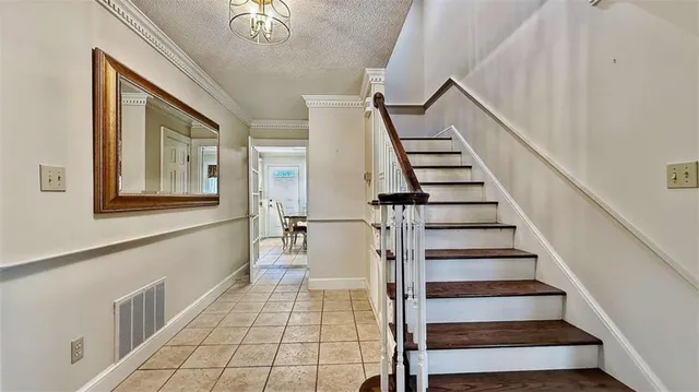 a bathroom with a bathtub and a window