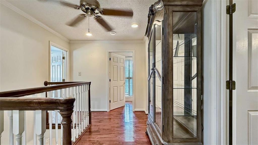 148 Simmons Street Trion, GA 30753 - Photo 37 of 73 a view of hallway with chandelier and wooden floor