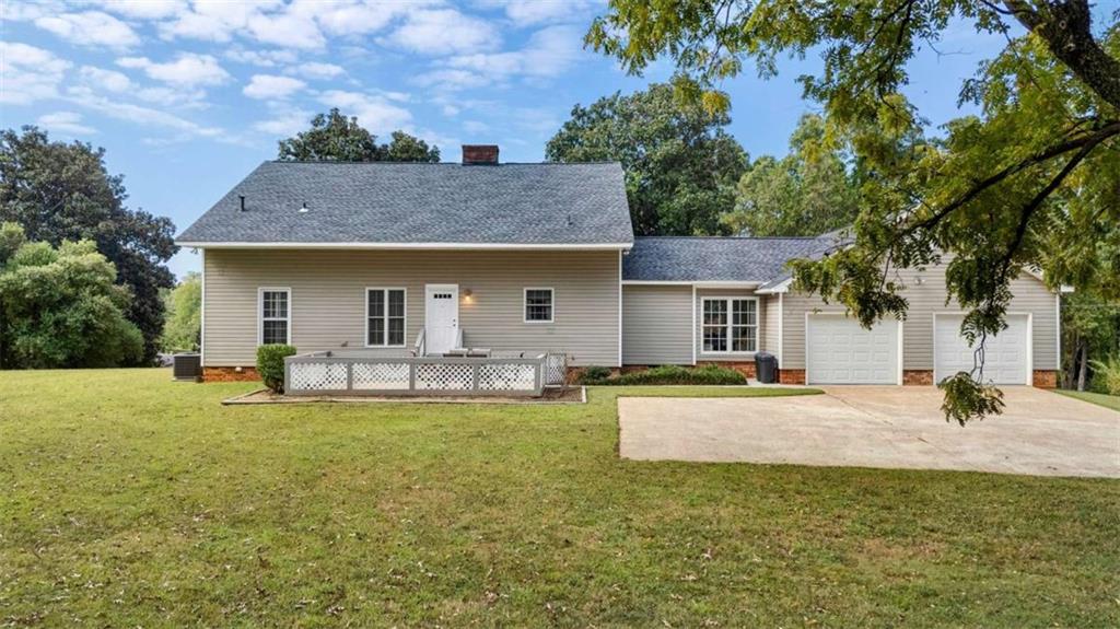 148 Simmons Street Trion, GA 30753 - Photo 4 of 73 a view of a house with swimming pool and a yard