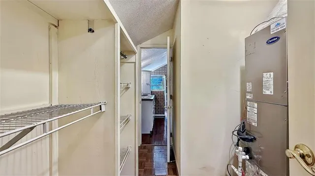 a bathroom with a tub and a sink