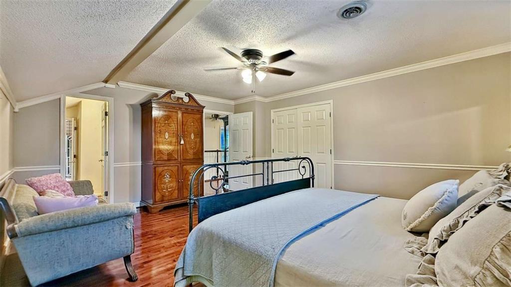 148 Simmons Street Trion, GA 30753 - Photo 45 of 73 a bedroom with a bed couch and view of living room