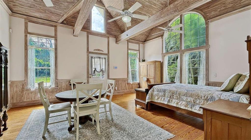 148 Simmons Street Trion, GA 30753 - Photo 54 of 73 a living room with a bed and wooden floor