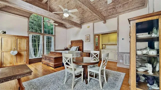 a aerial view of a house with a yard