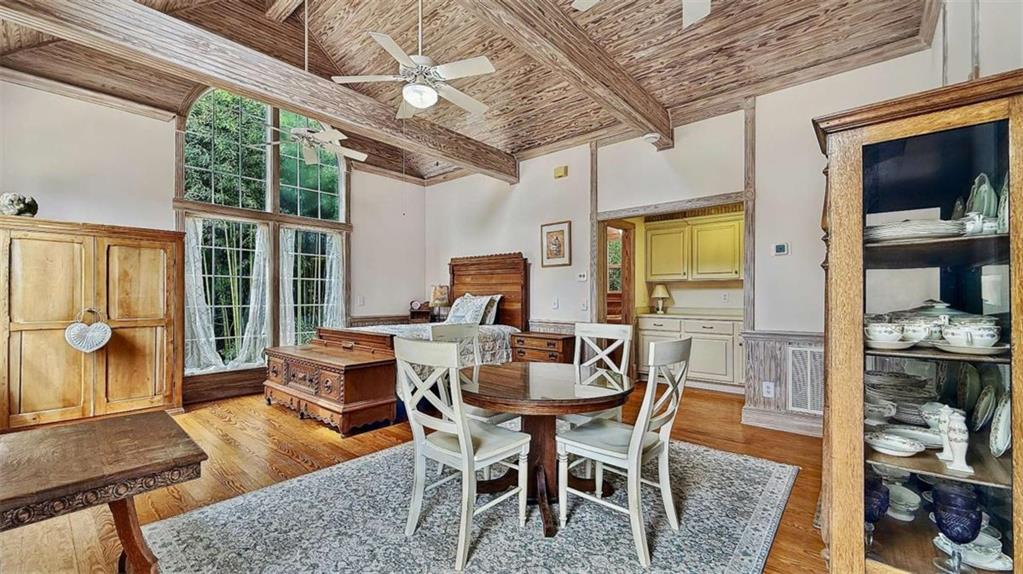 148 Simmons Street Trion, GA 30753 - Photo 55 of 73 a dining room with furniture a flat screen tv and a large window