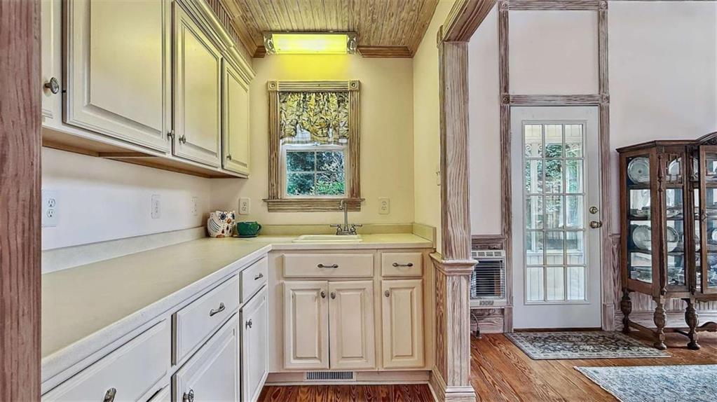 148 Simmons Street Trion, GA 30753 - Photo 56 of 73 a kitchen with granite countertop a sink and a window