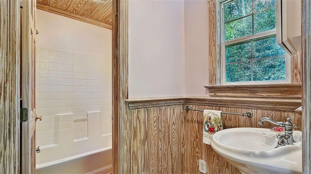 148 Simmons Street Trion, GA 30753 - Photo 57 of 73 a bathroom with a tub and a sink